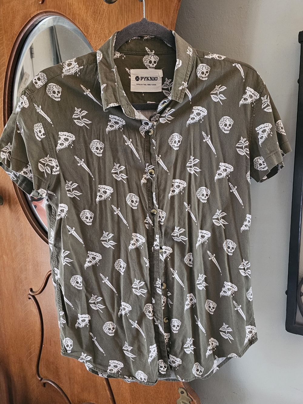 Olive Green Short-Sleeve Button-Up Shirt with White Skull Print